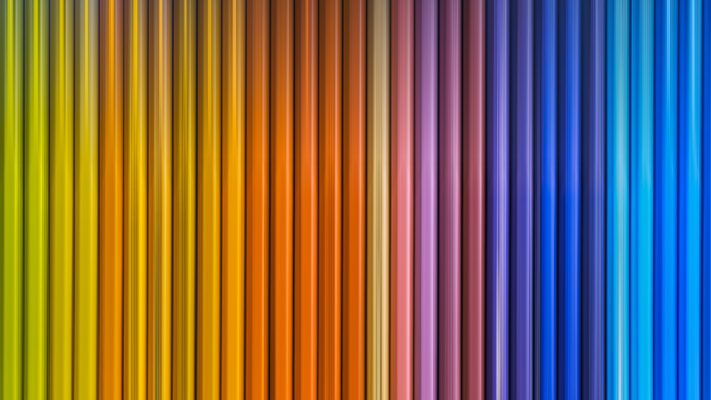 wooden colored pencils with motion blur effect